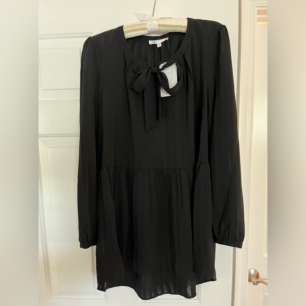Woman’s black shear blouse